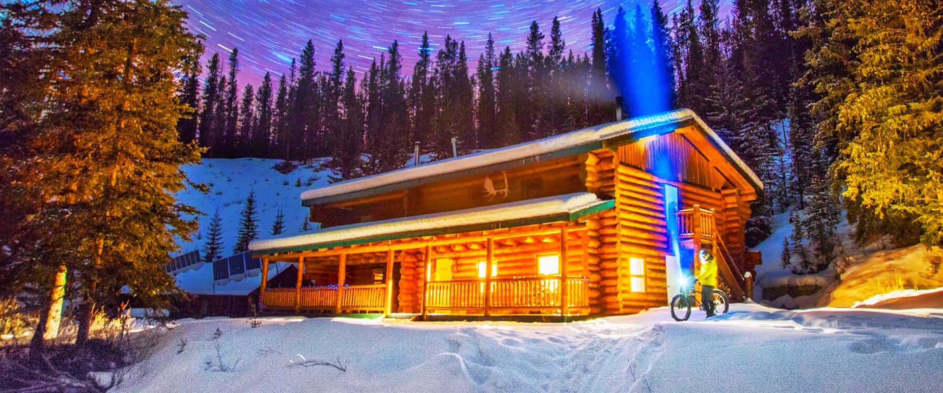 Sundance Lodge Backcountry Winter Log Cabin Exterior Sundance Lodge Winter Log Cabin in Banff, Canadian Rockies