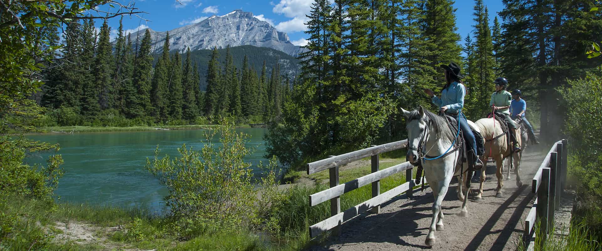 Ride along the Bow River on the Bow River Ride with Banff Trail Riders in the Canadian Rockies